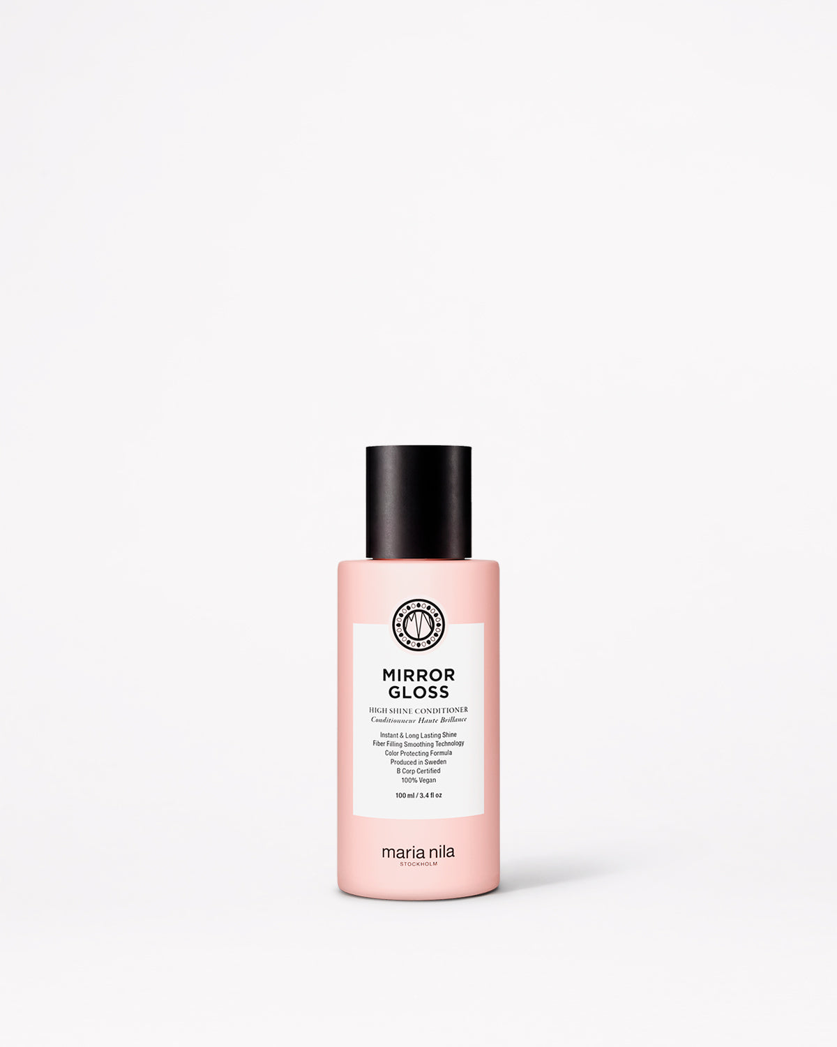 A bottle of Maria Nila Mirror Gloss Conditioner in a pale pink bottle with a black cap and white label, centered on a light gray background.