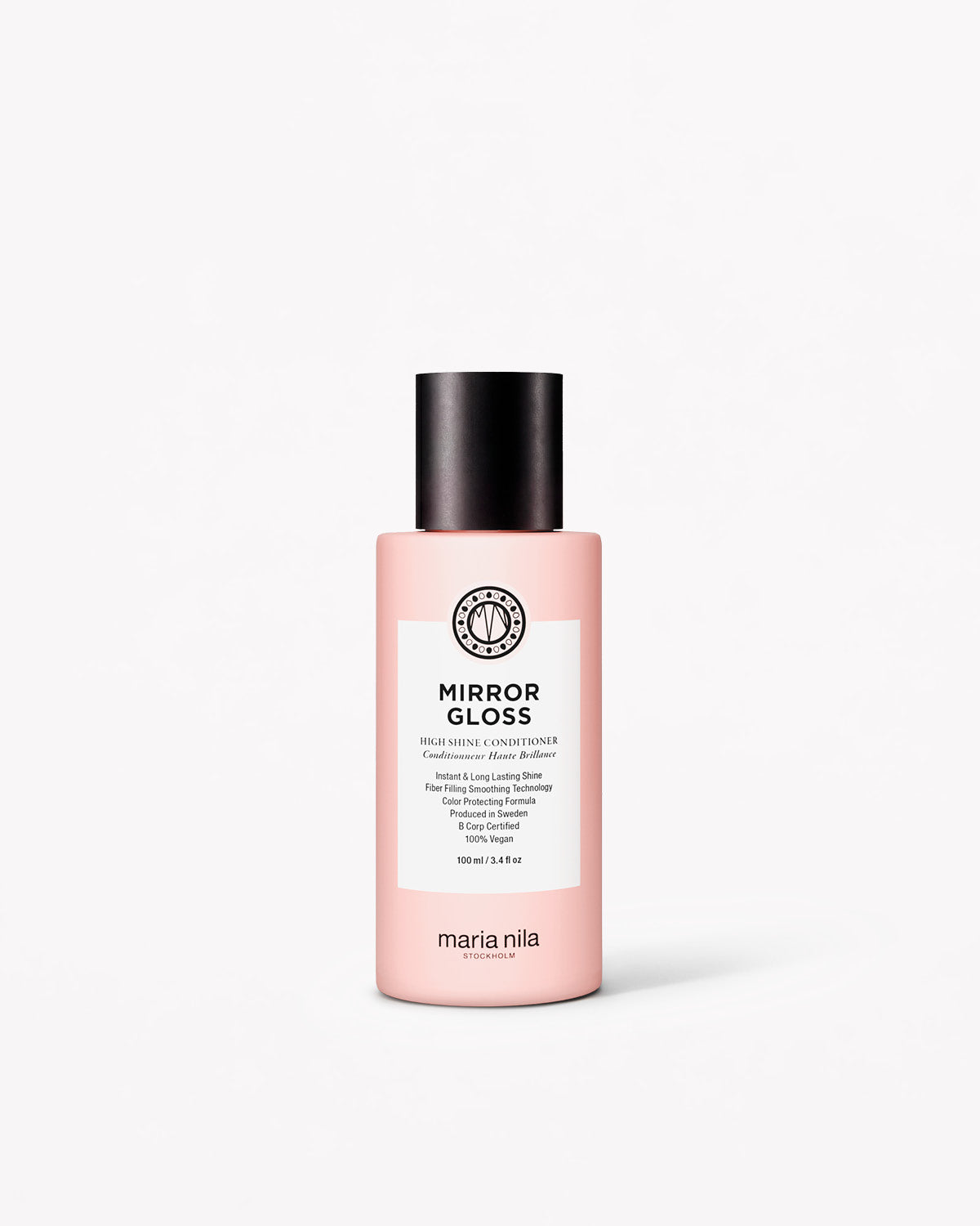 Pink bottle of Maria Nila Mirror Gloss Conditioner Travel on a white background