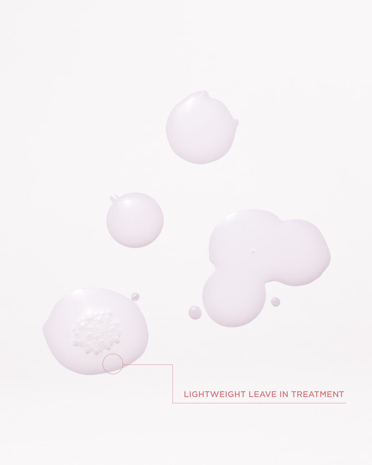 Lightweight leave-in Gloss Coat treatment droplets on a soft pink background