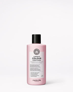 Color preserving conditioner for colored hair